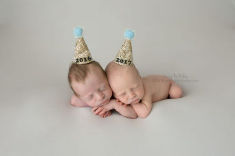 newborn twin babies tiny hats new years babies